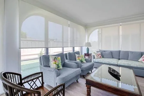Sunscreen roller blind filtering Dubai daylight