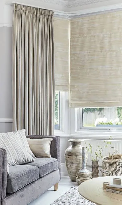 Tall roman blind on a floor-to-ceiling Dubai window